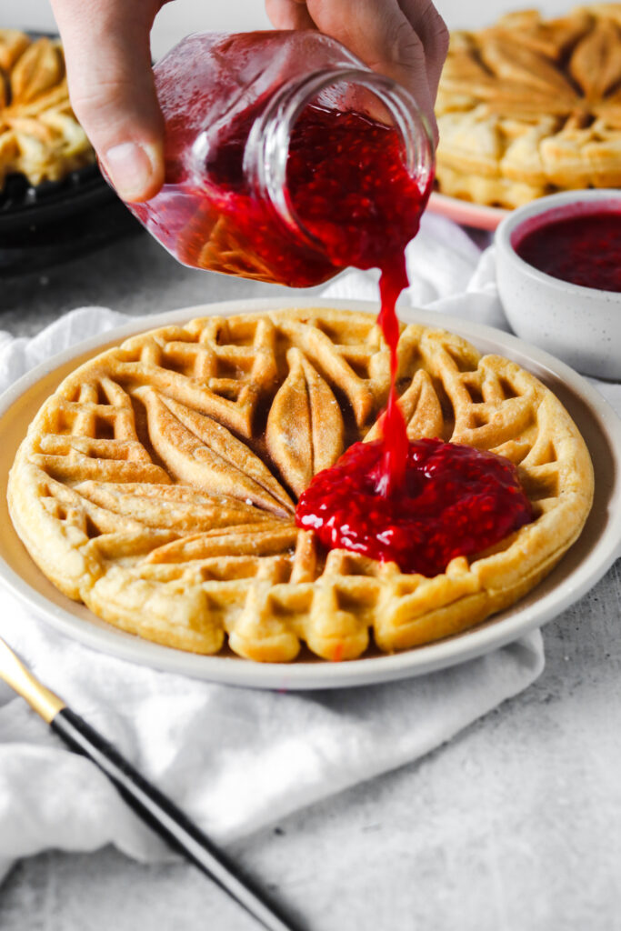 Nutella stuffed waffle with raspberry compote